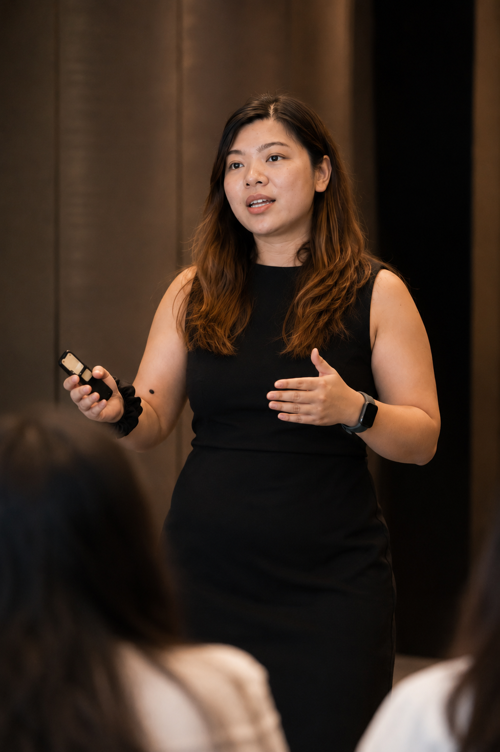 Jessie Tung speaking at an event